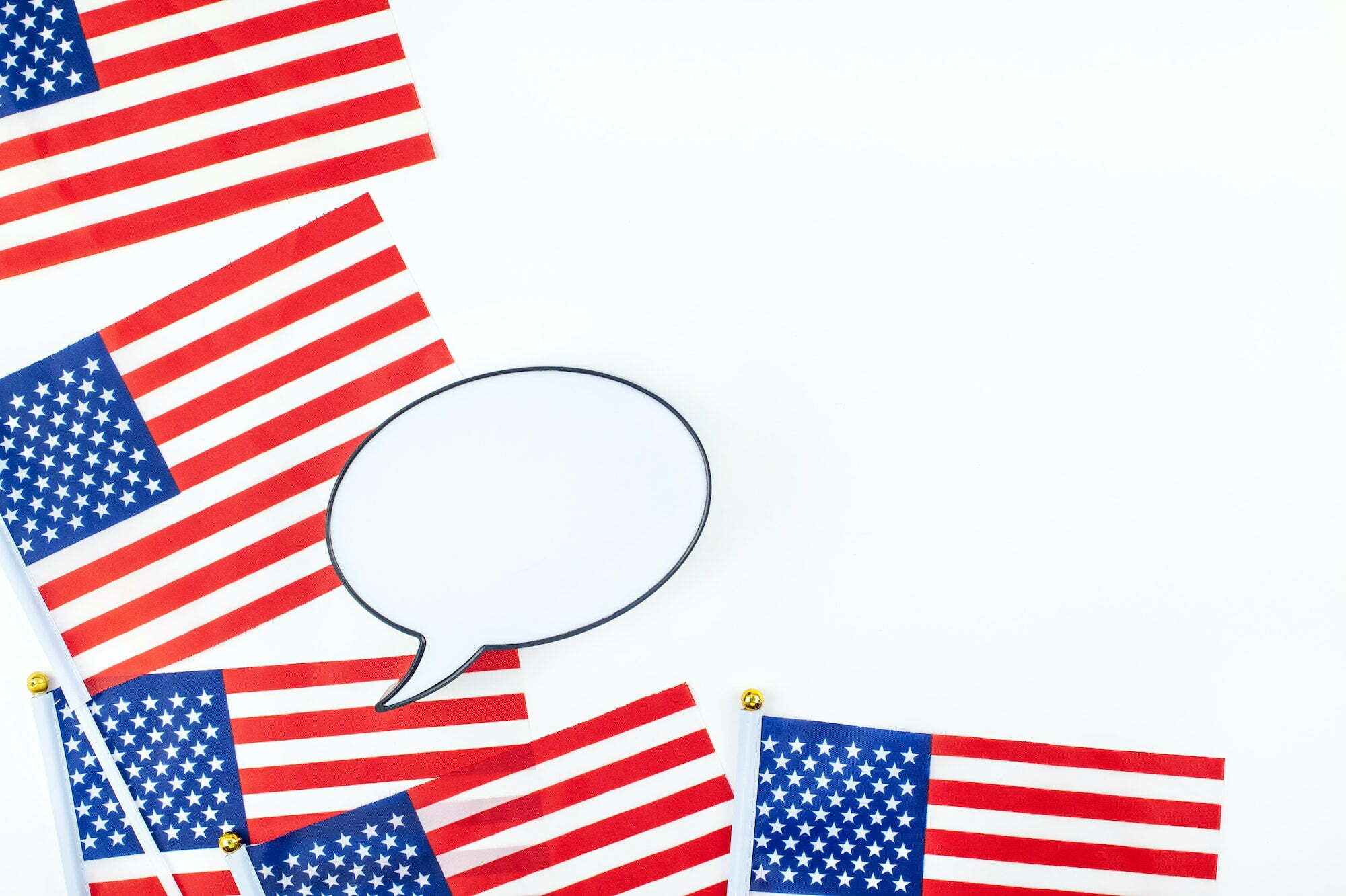 American flags on white background top view