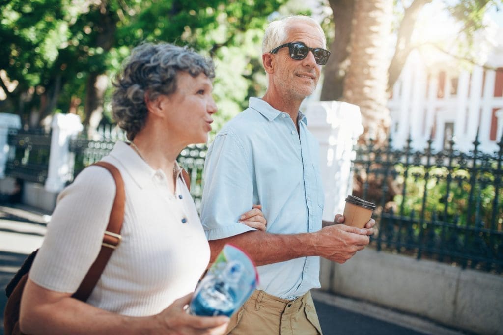 Mature tourist roaming in a town